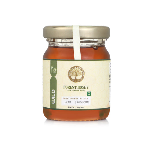 Signature honey collection featuring seven premium wild and organic honey types packed in elegant artisanal glass containers