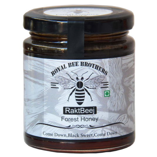 Organic wild black honey by Raktbeej, supporting tribal communities in Chhattisgarh and Jharkhand.