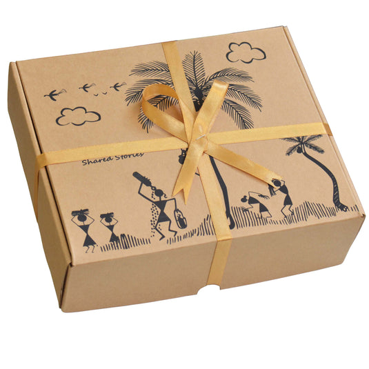 Brown festive gift box with yellow ribbon and tropical designs on a white background
